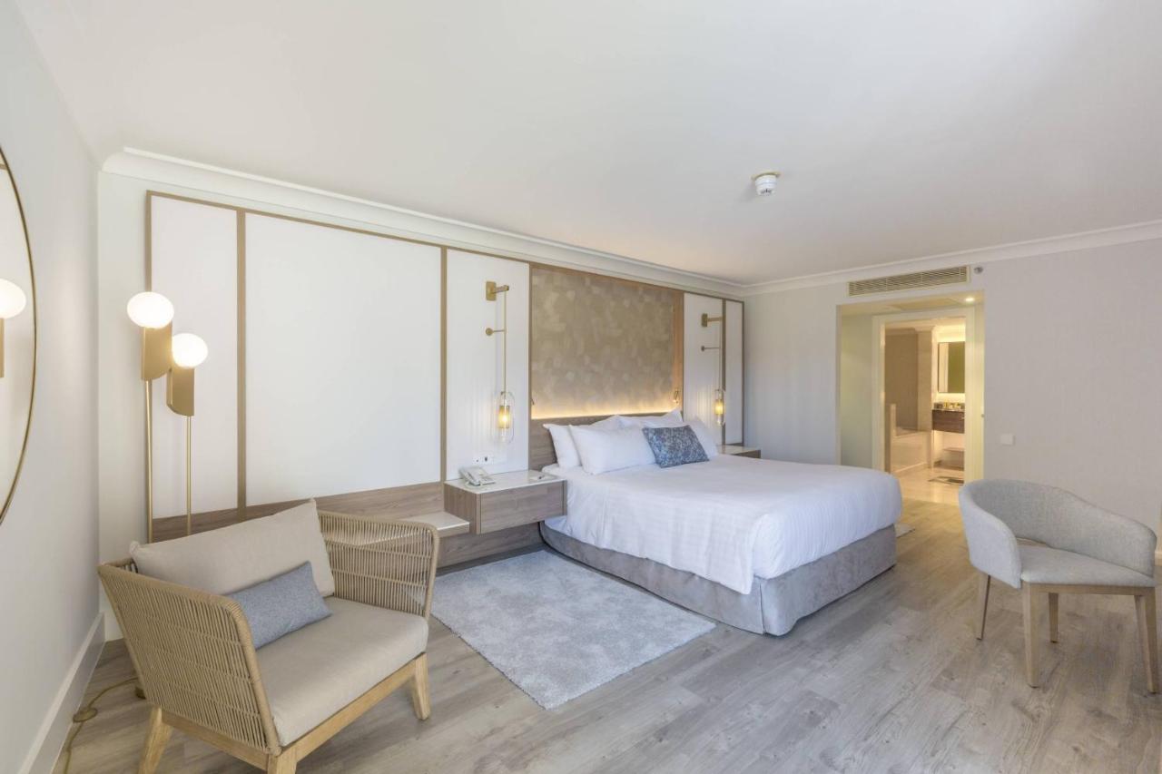 Standaard Suite met Kingsize Bed, Slaapbank, Balkon en Uitzicht op het Binnenland
